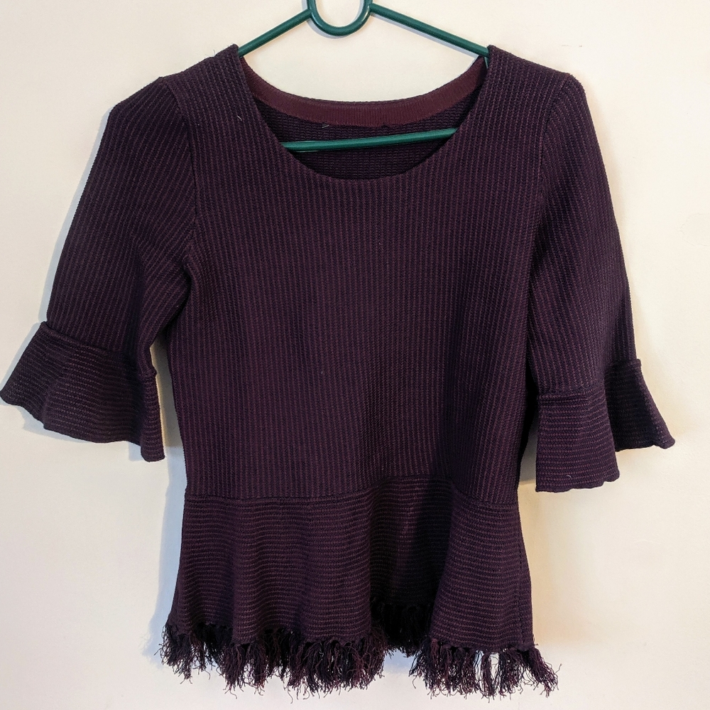 Peplum top with fringe